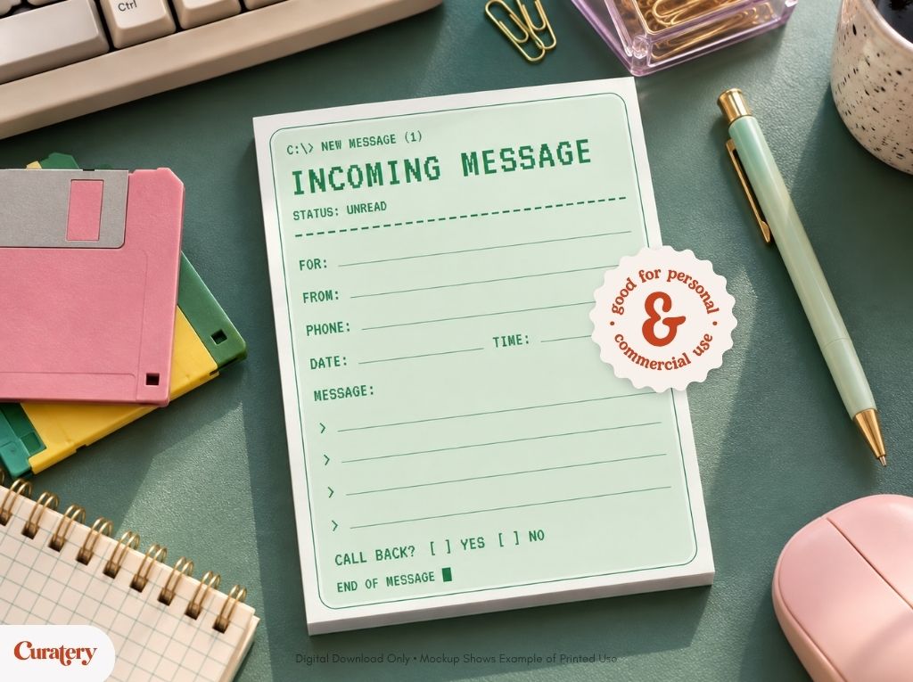 A light green notepad designed to resemble an old computer message interface displays "INCOMING MESSAGE" and various message fields, partially covered by a circular sticker that reads "good for personal & commercial use", all situated on a desk with retro computer peripherals.
