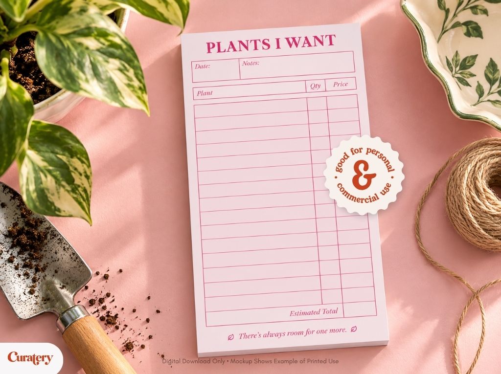 A pink notepad titled "PLANTS I WANT" with columns for plant, quantity, and price, and a sticker saying "good for personal & commercial use," is displayed on a pink surface with a plant, a trowel, and twine.